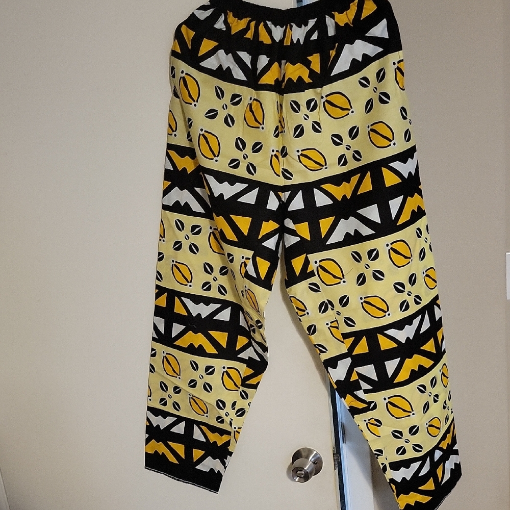 Geometric Patterned Pants in Yellow and Black. Cap Assorted